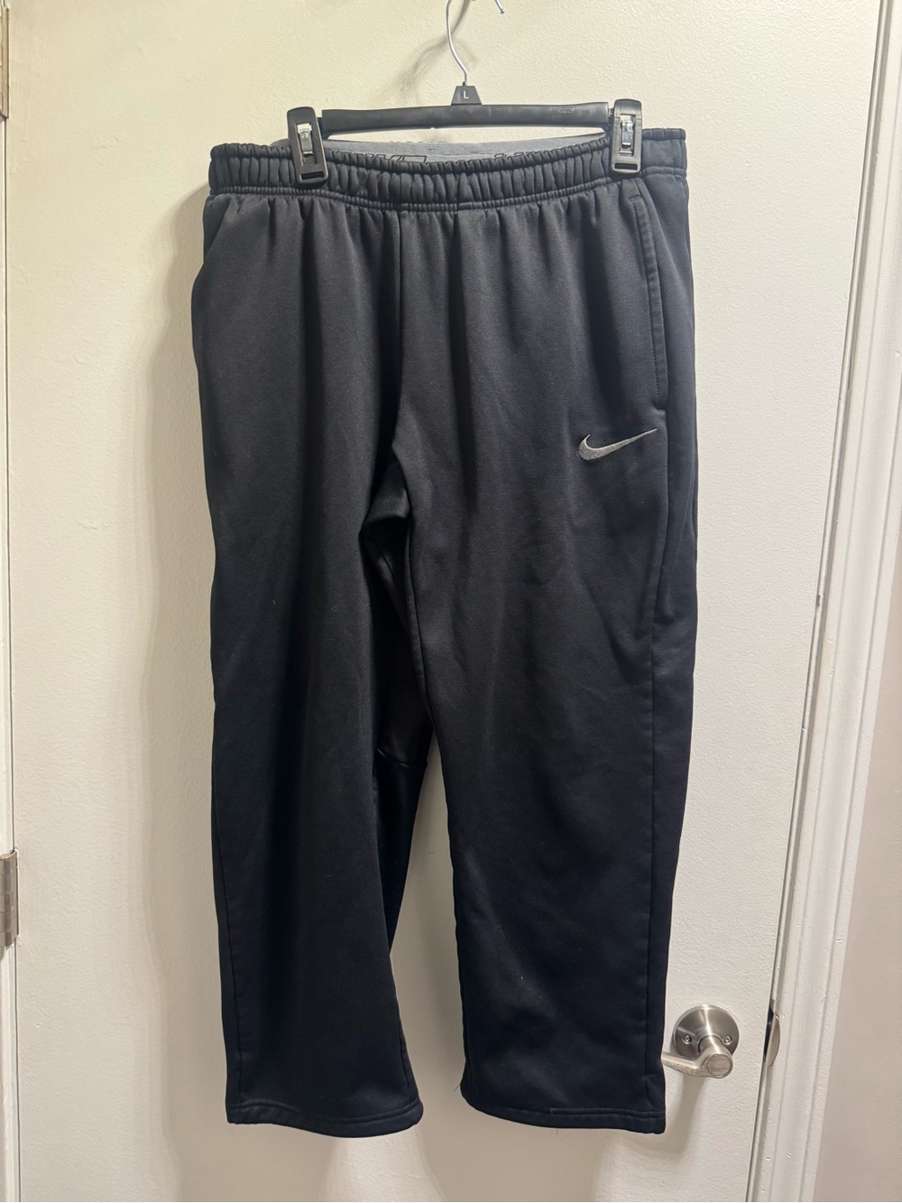 * Woman’s Black Nike Therma-Fit Joggers With Pockets